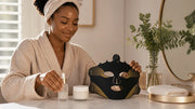 Woman arranging a VanqHeal Wireless Plus LED mask with gentle serum and moisturiser