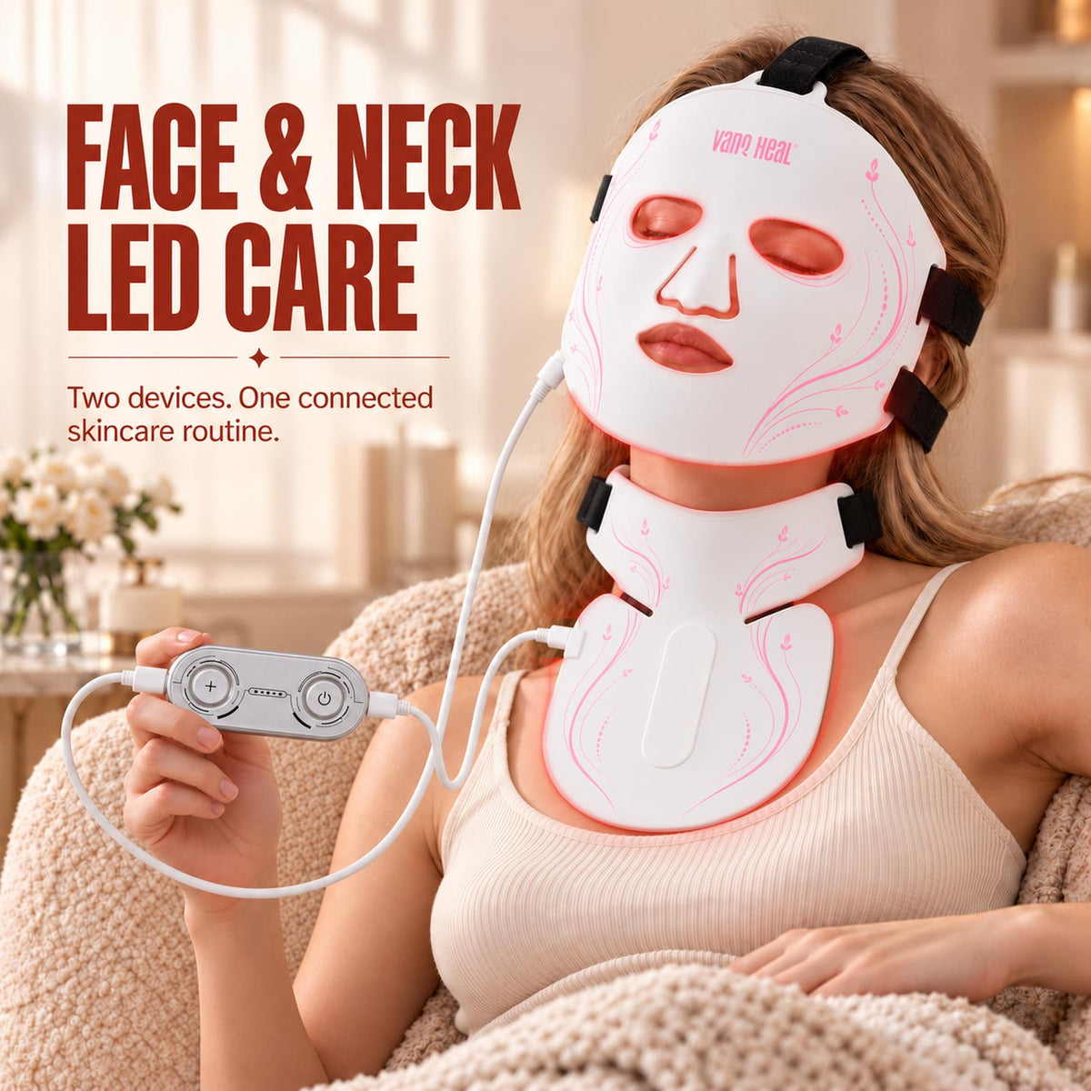 Woman wearing the VanqHeal face and neck LED mask set while holding its wired controller in a home setting.