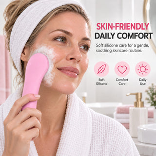 Woman holding the Electric facial cleansing brush against her cheek, alongside soft-silicone and daily-care labels.
