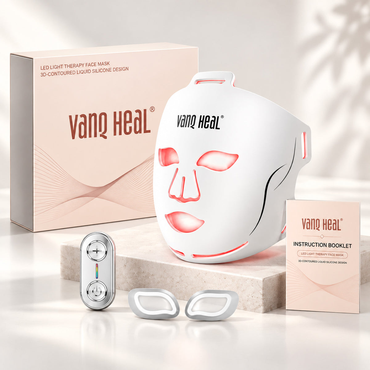 VanqHeal 3D infrared face mask controller connected by cable for selecting red, blue and yellow light programmes.