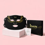 VanqHeal Diamond Edition LED light therapy mask with packaging box and manual on pink display