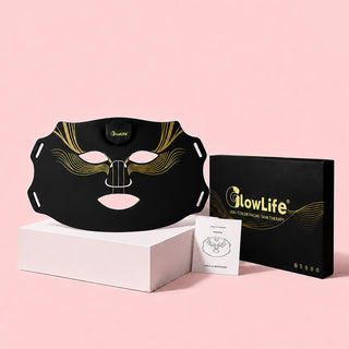 VanqHeal Diamond Edition LED light therapy mask with packaging box and manual on pink display