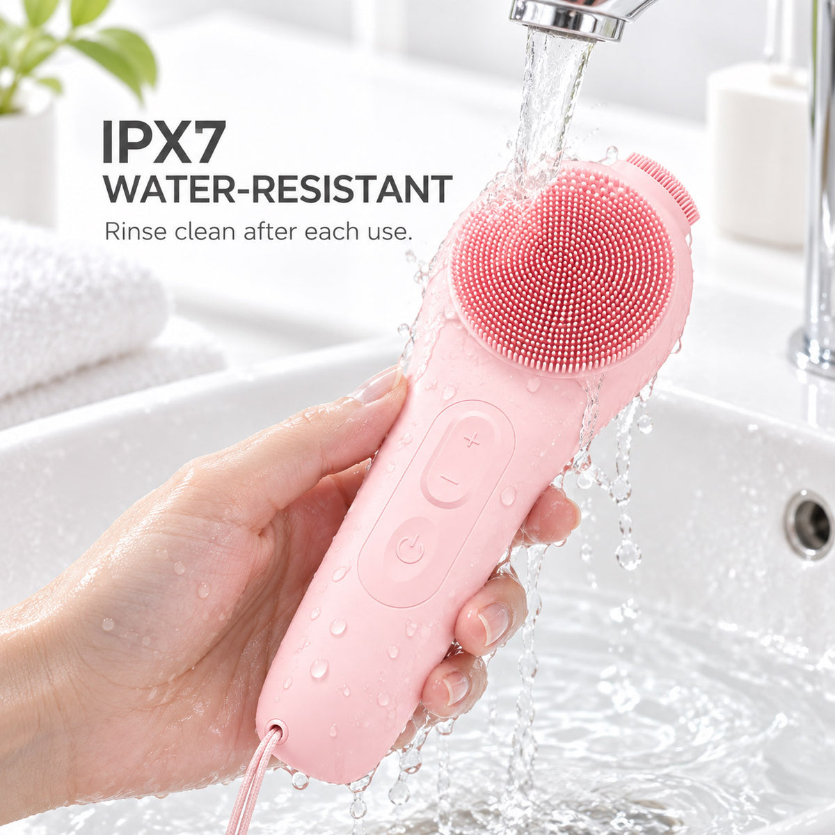 VanqHeal silicone facial cleansing brush rinsed under running water, with an IPX7 water-resistance label.